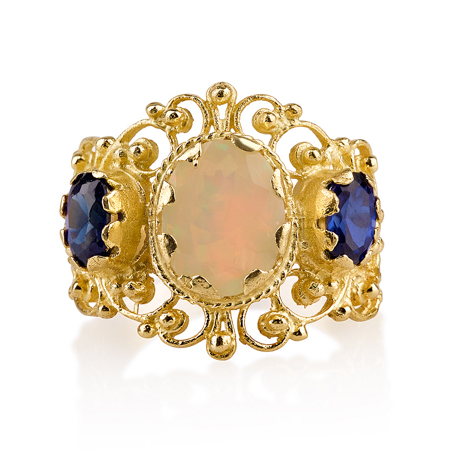 טבעת זהב מעוטרת בשיבוץ אבני מונסטון וספיר זירקון